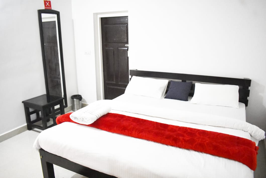 Private bedroom with attached bathroom at Coorg homestay